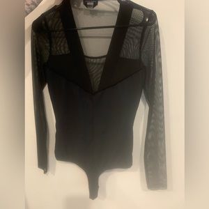 Bebe Bodysuit Long Mesh sleeves Mesh top and back Really unique top design. NWT